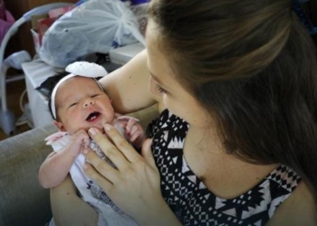 Rođena beba sa posebnim osmehom